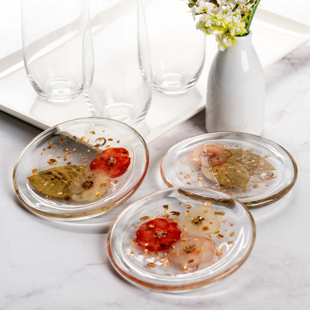 Preserving flowers in resin