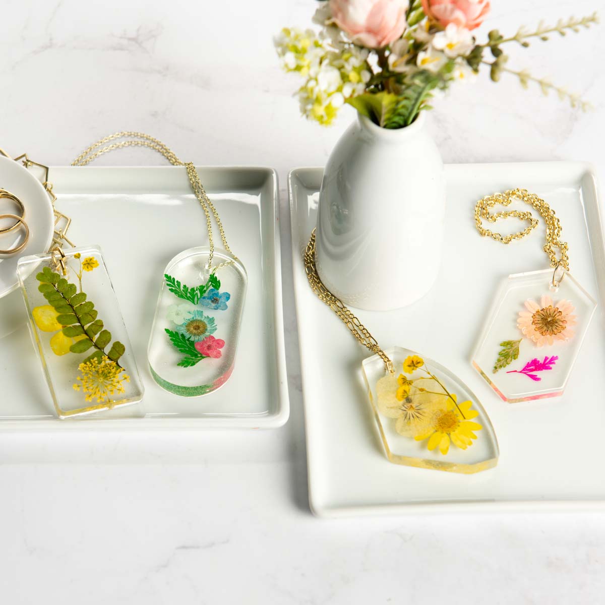 Mod Podge resin necklace pendants