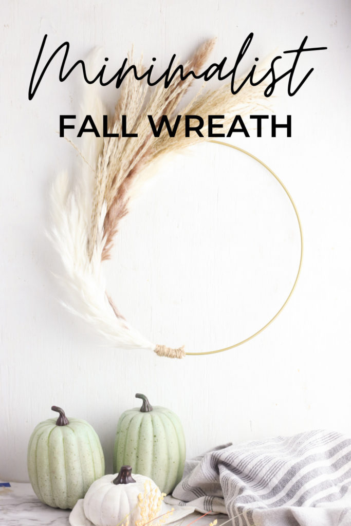 Pampas grass hoop wreath with text overlay.